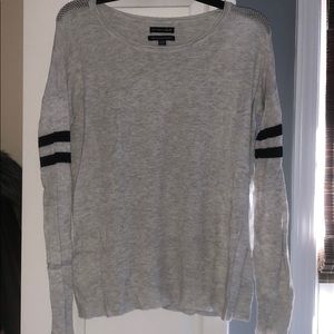 Gray sweater like top.